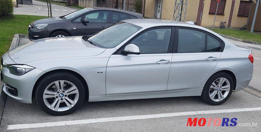 2014' BMW Serija 3 318D photo #1
