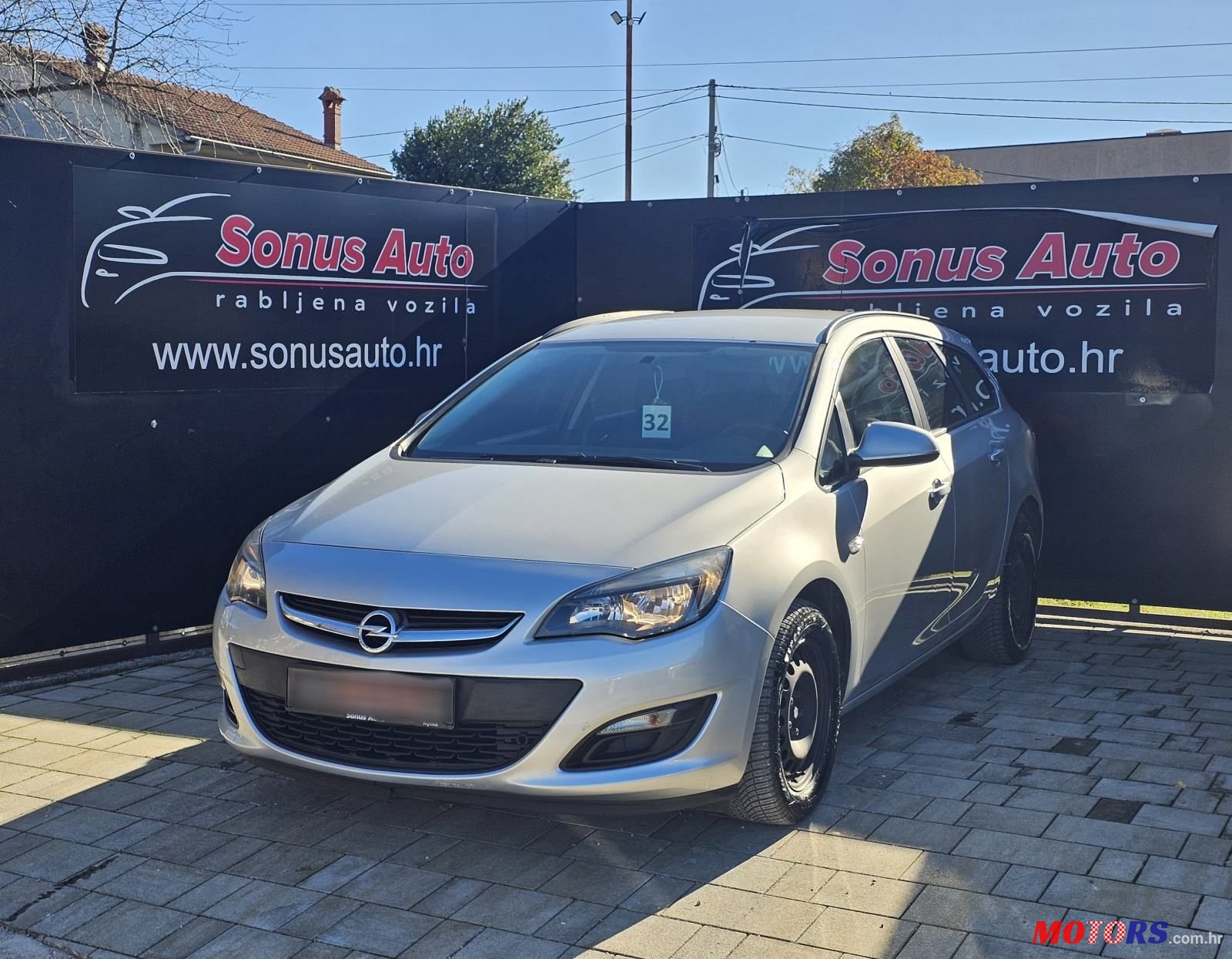 2015' Opel Astra Karavan photo #1