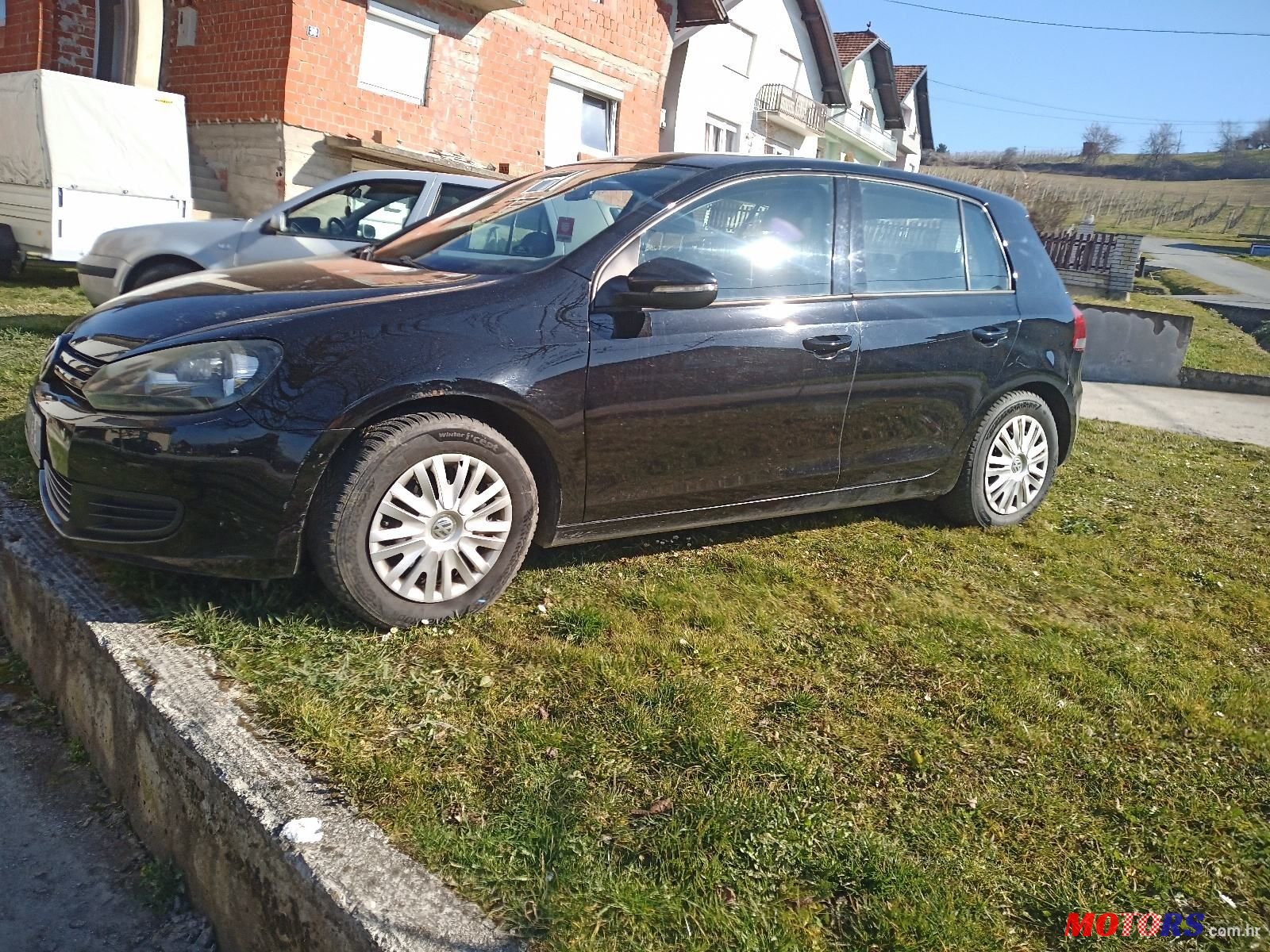 2010' Volkswagen Golf VI 1,6 Tdi photo #3