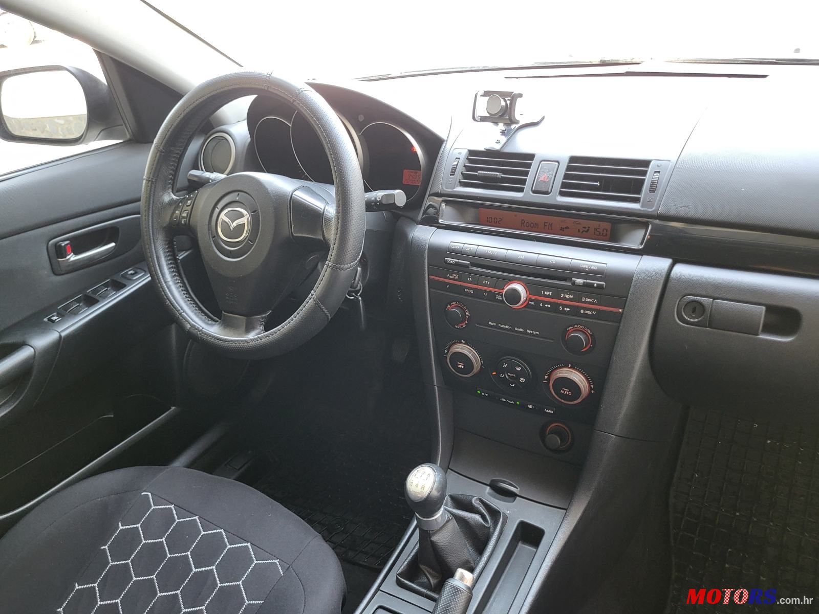 2004' Mazda 3 Sport 1,4 I Te photo #2