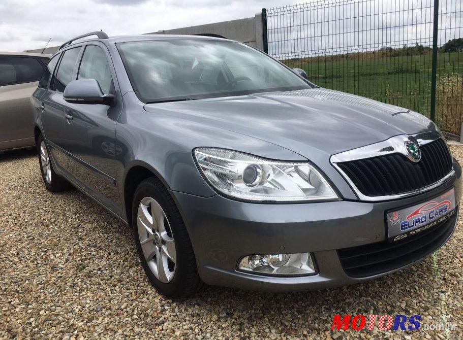 2013' Skoda Octavia Combi 1,6 Tdi photo #1