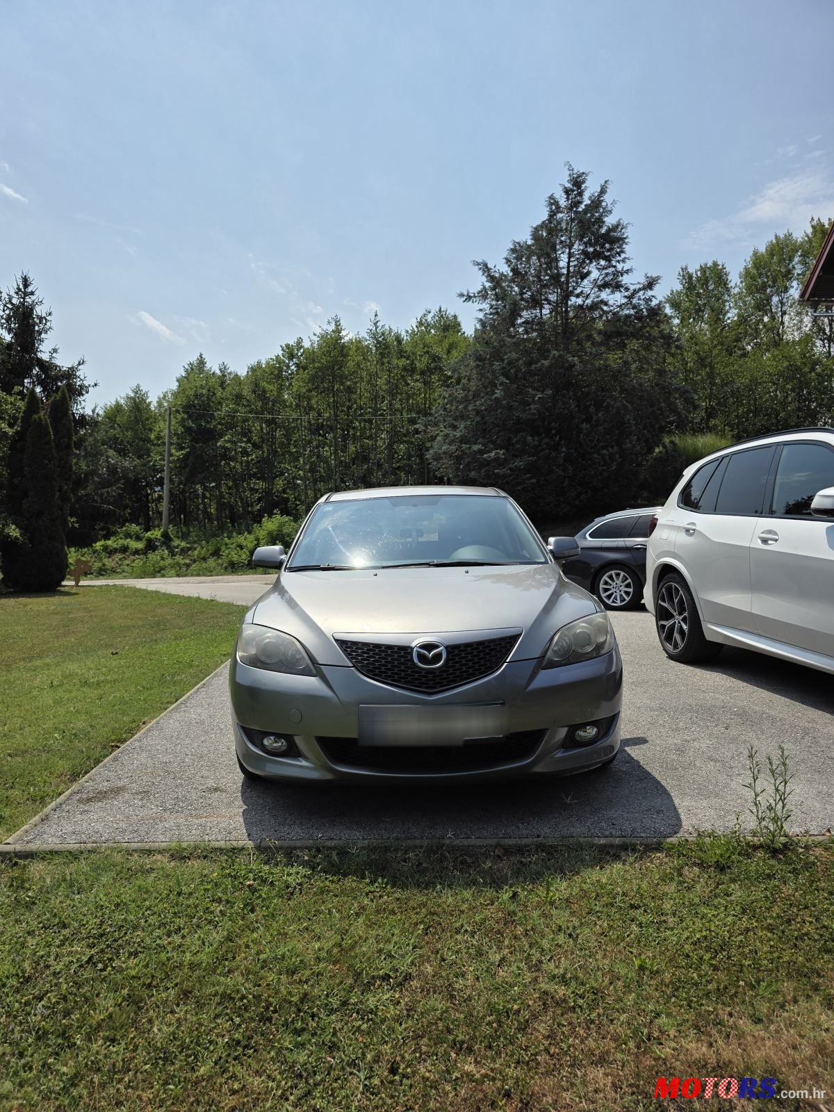 2006' Mazda 3 Sport 1,4 I Ce photo #1