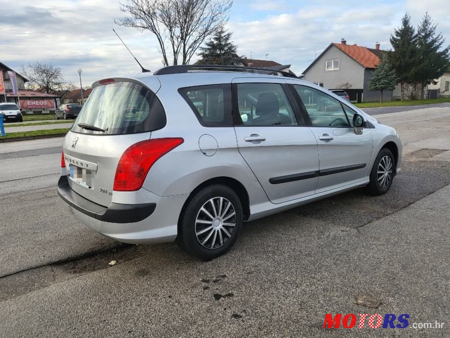 2011' Peugeot 308 Sw photo #3