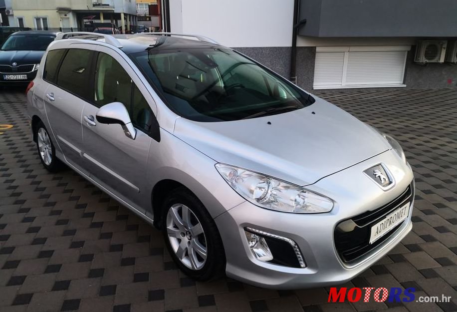2011' Peugeot 308 Sw 1,6 Hdi photo #1