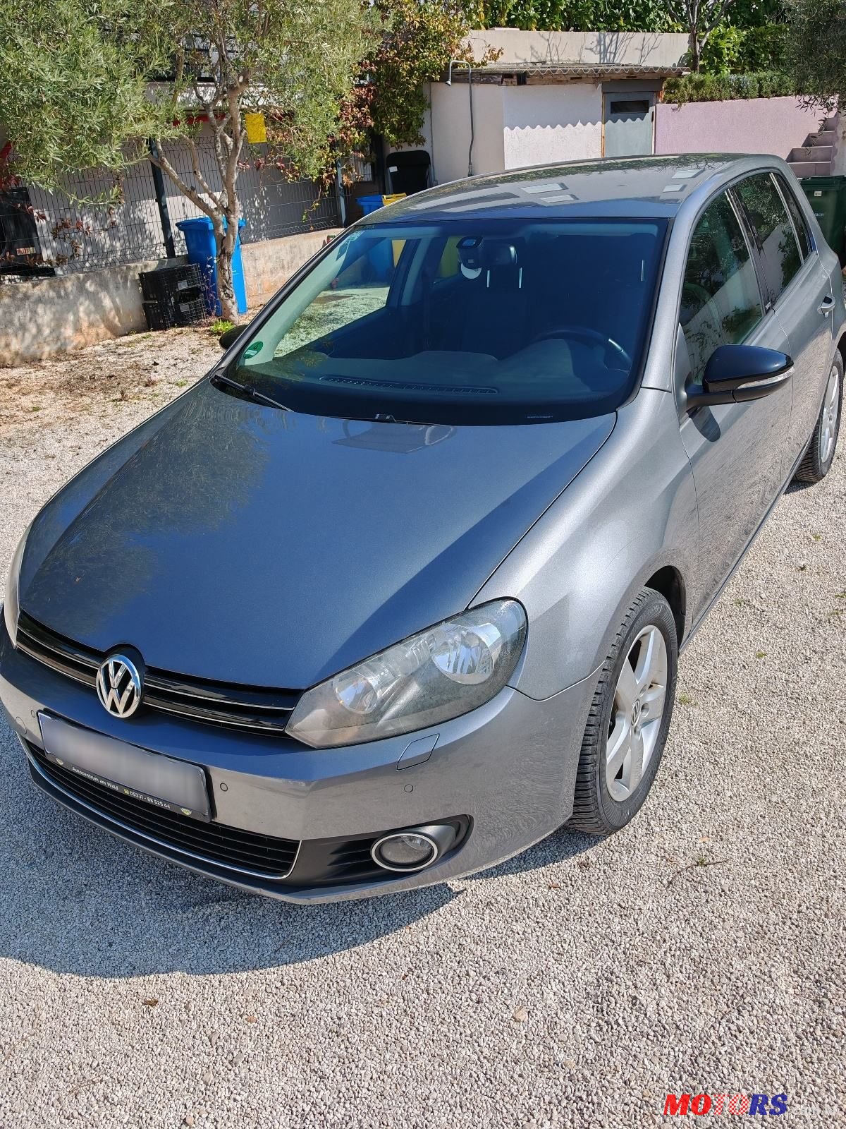 2011' Volkswagen Golf VI 1,6 Tdi photo #1