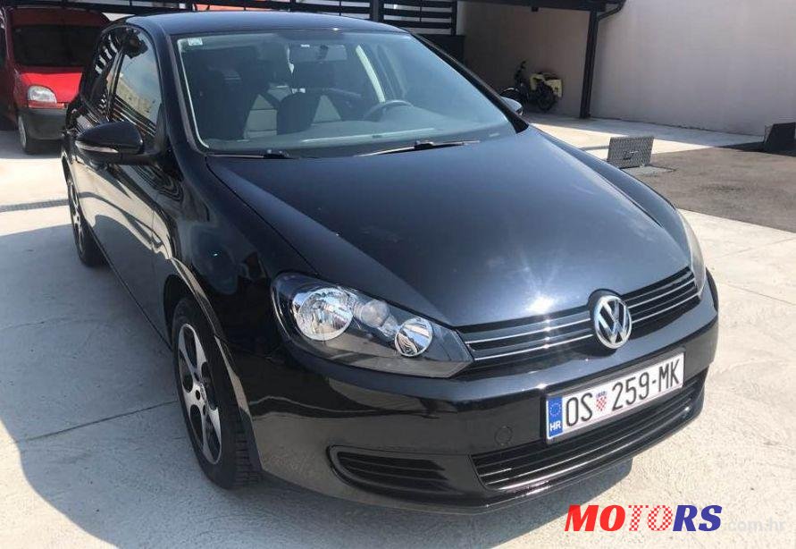 2010' Volkswagen Golf VI 1,6 Tdi photo #1