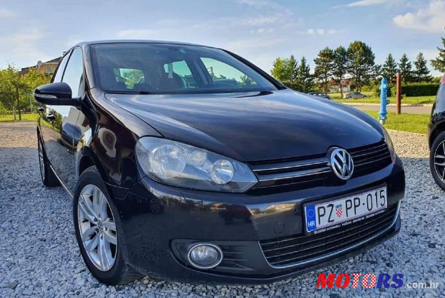 2011' Volkswagen Golf VI 1,6 Tdi photo #1