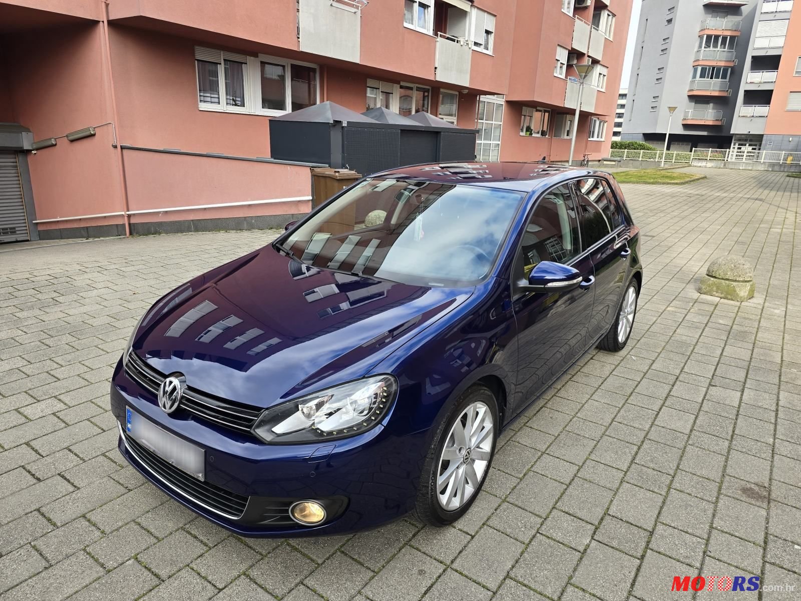 2012' Volkswagen Golf VI 1,6 Tdi photo #1