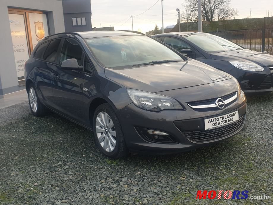 2014' Opel Astra Karavan photo #2