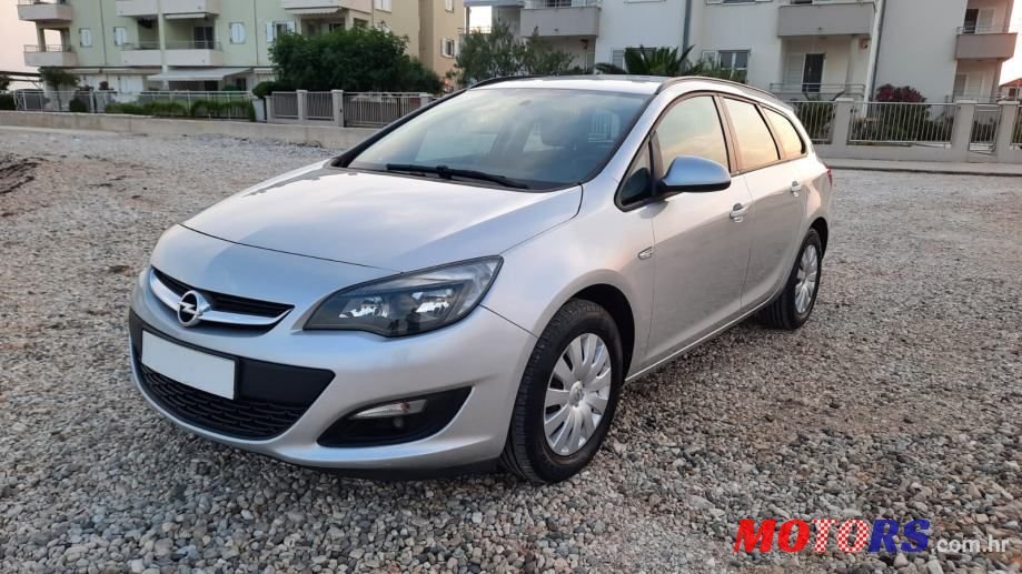 2015' Opel Astra Karavan photo #1