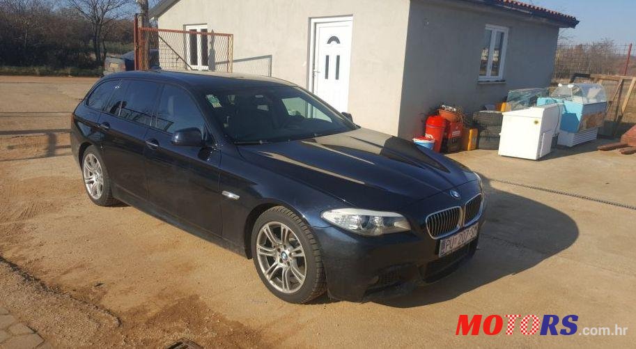 2011' BMW 5 Series 520D photo #2