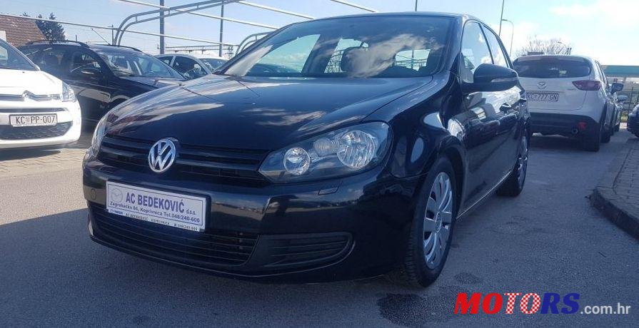 2009' Volkswagen Golf VI 1,6 Tdi photo #1
