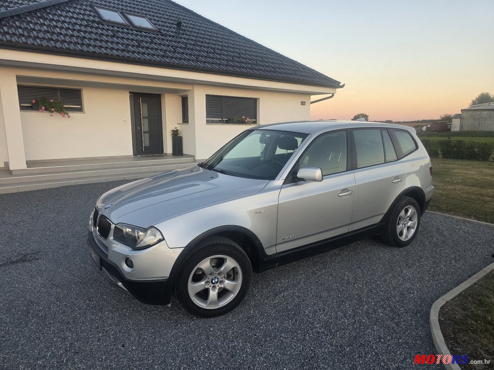 2009' BMW X3 Xdrive20D photo #1