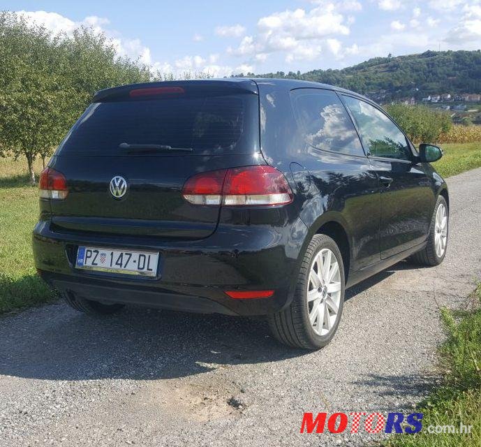 2009' Volkswagen Golf VI 1,6 Tdi photo #1