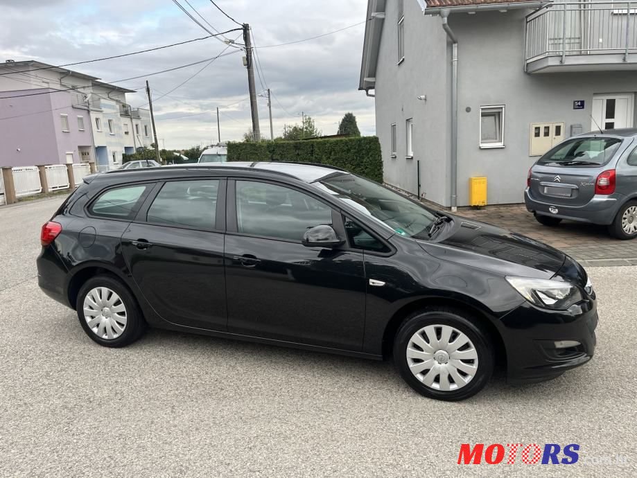 2014' Opel Astra Karavan photo #3