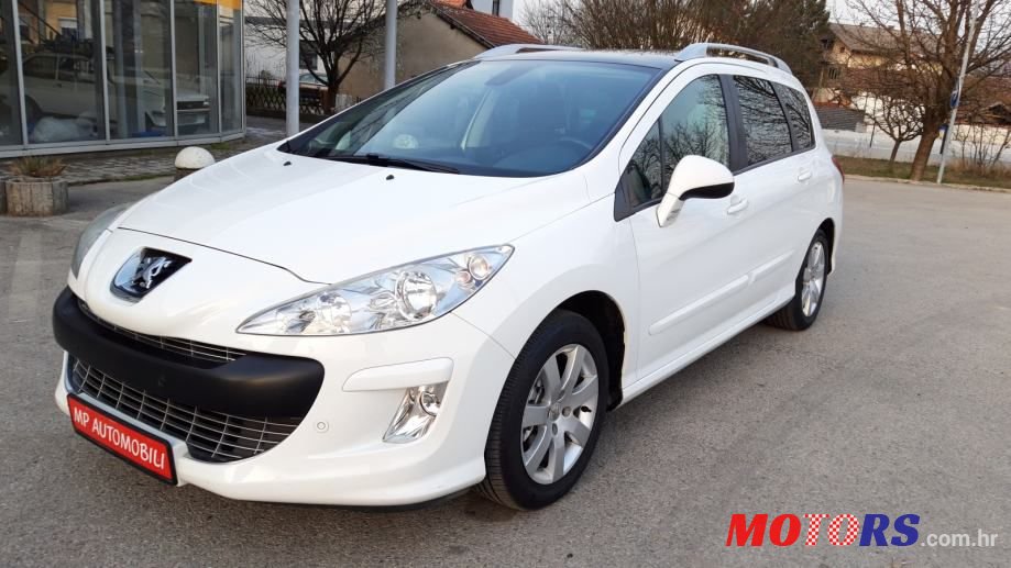 2010' Peugeot 308 Sw photo #1