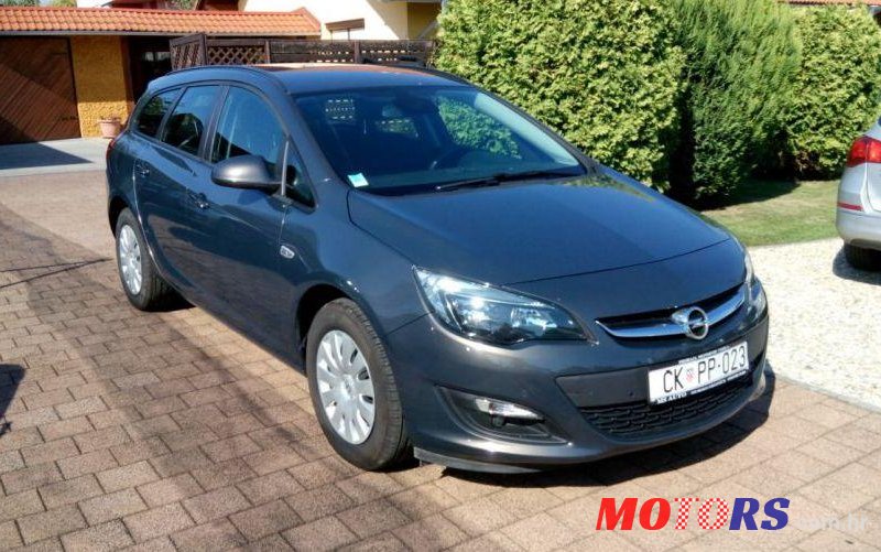 2014' Opel Astra Karavan photo #1