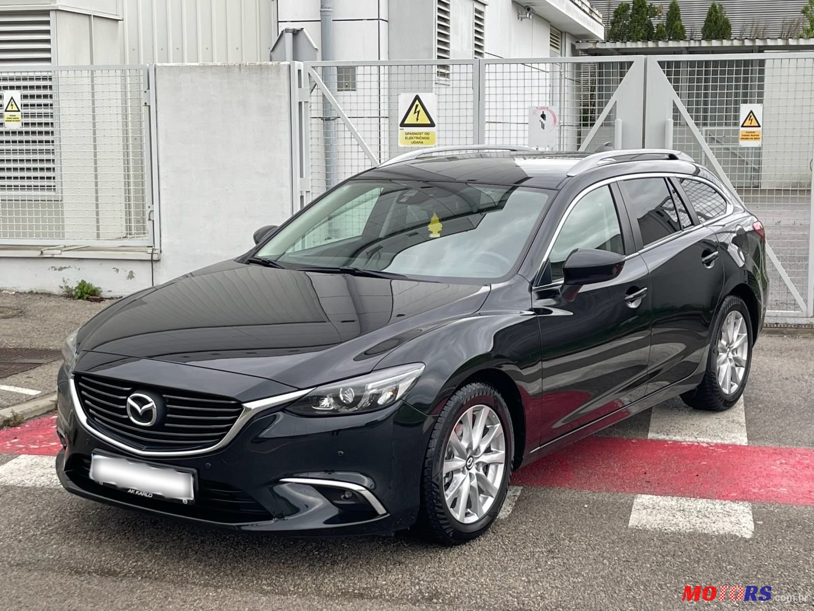 2015' Mazda 6 Sport Combi photo #1