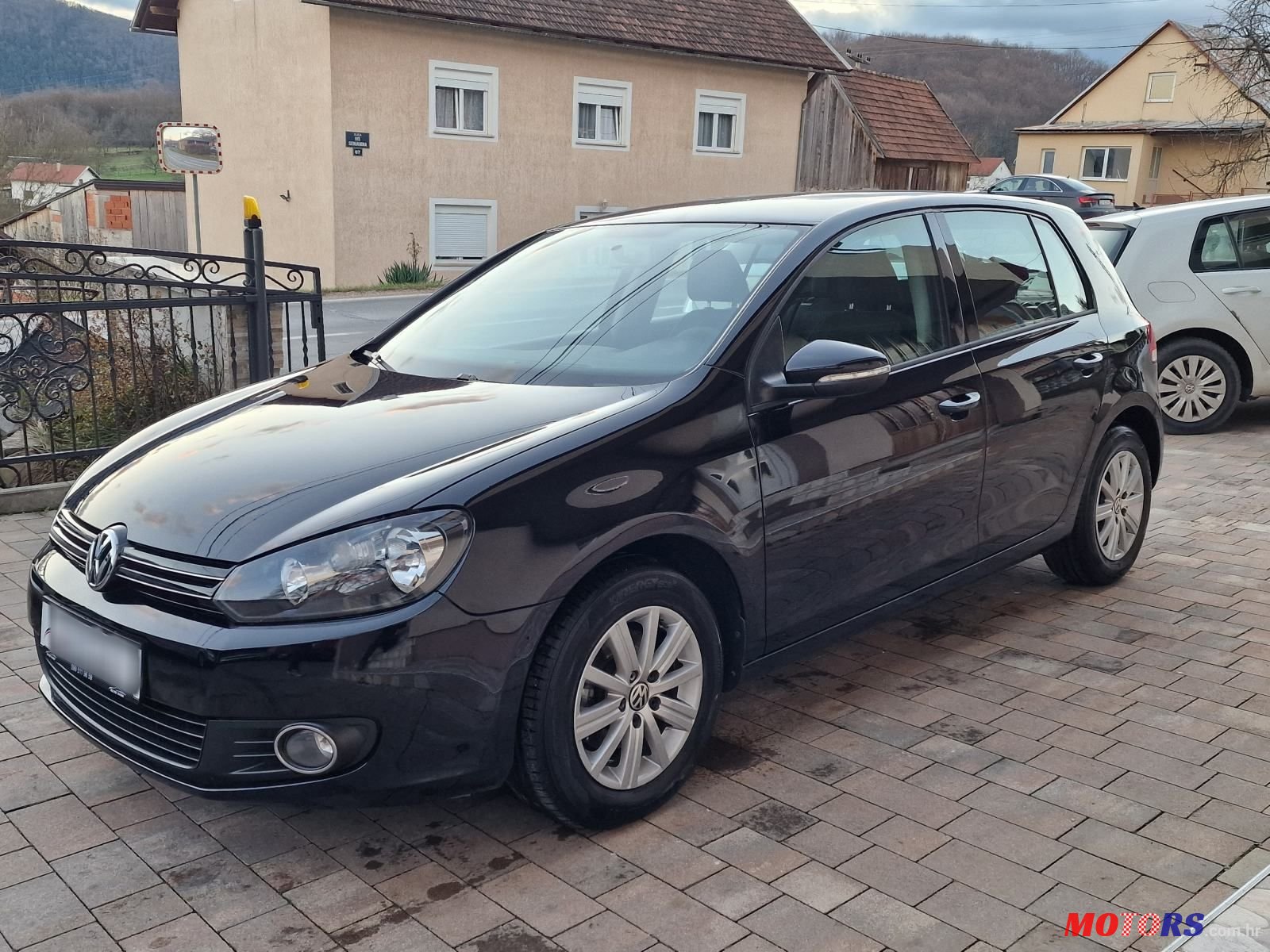 2012' Volkswagen Golf VI 1,6 Tdi photo #2