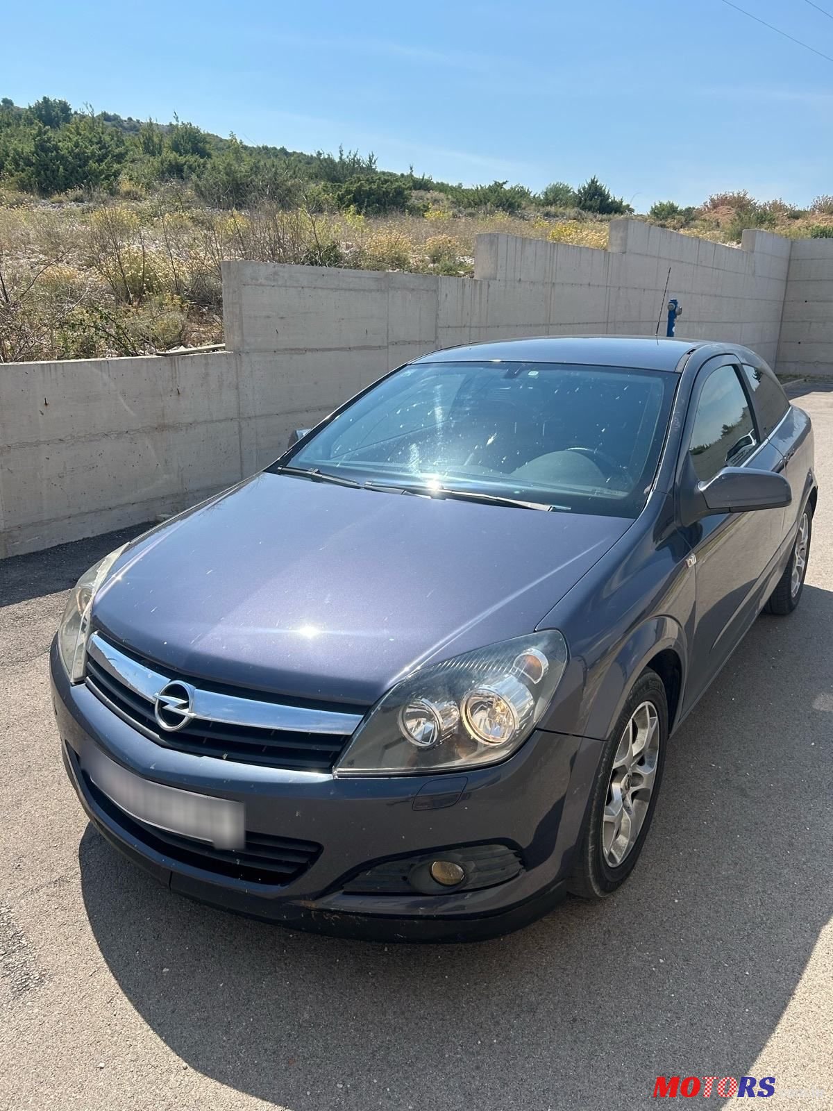 2006' Opel Astra Coupe photo #1
