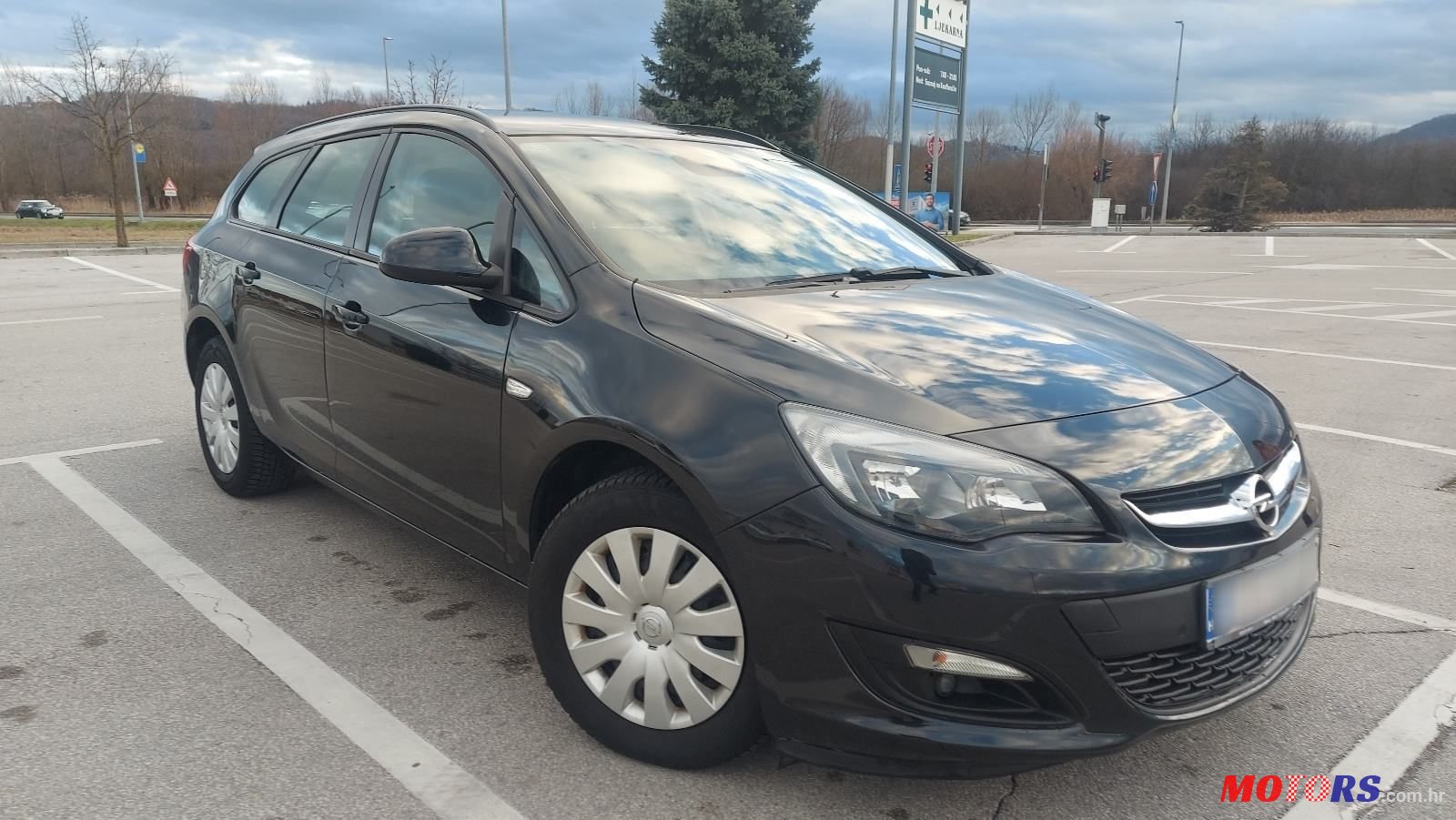 2014' Opel Astra Karavan photo #3