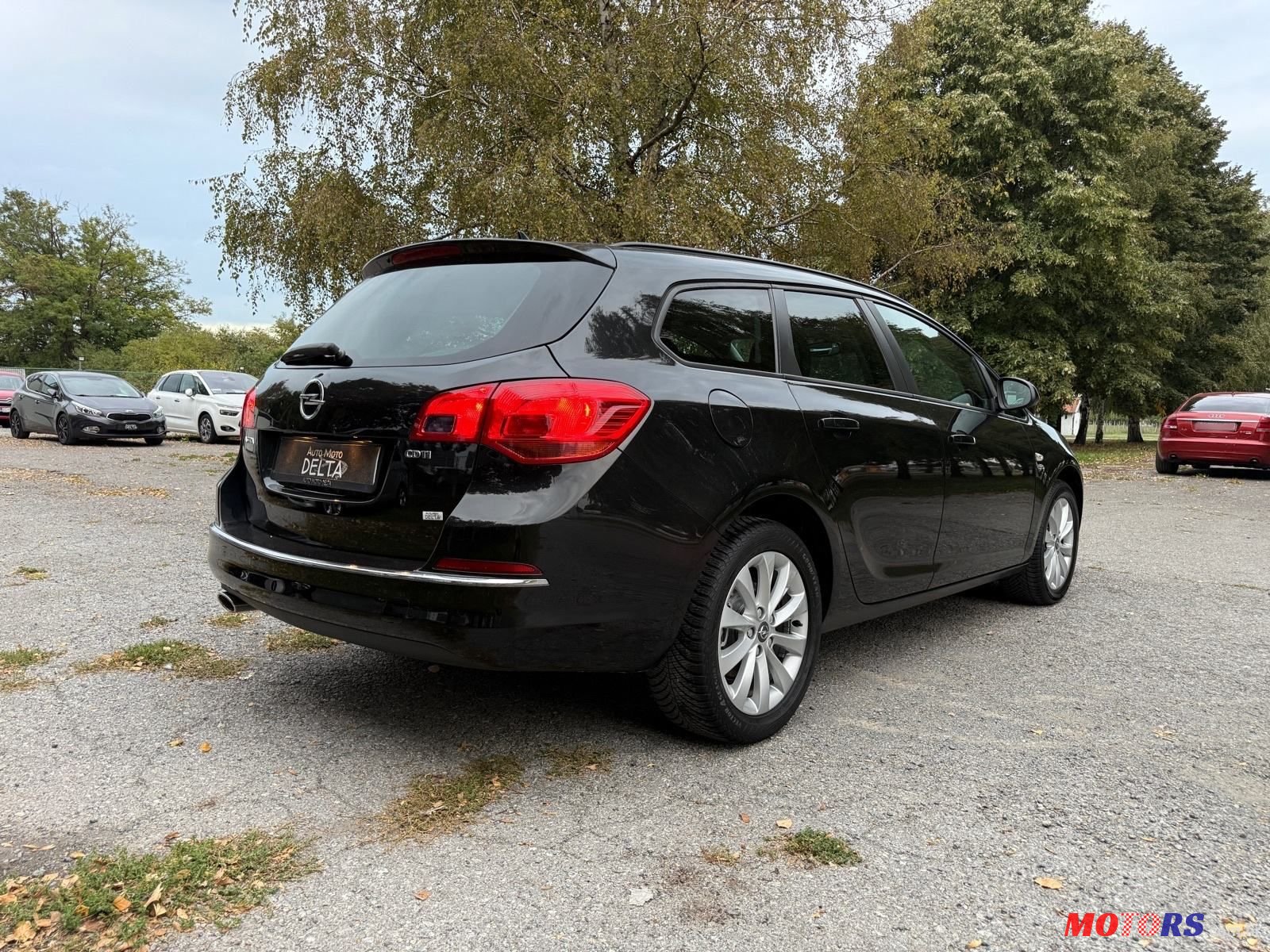 2013' Opel Astra Karavan photo #5