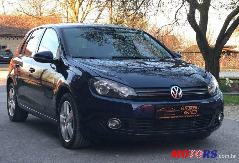 2011' Volkswagen Golf VI 1,6 Tdi photo #1