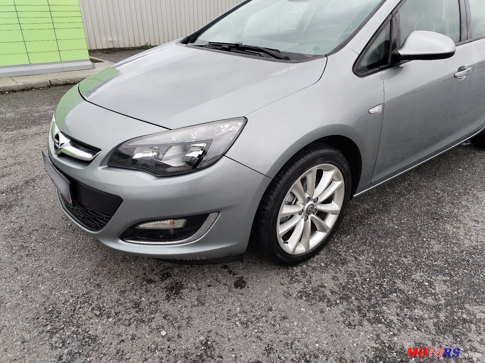 2013' Opel Astra Karavan photo #1