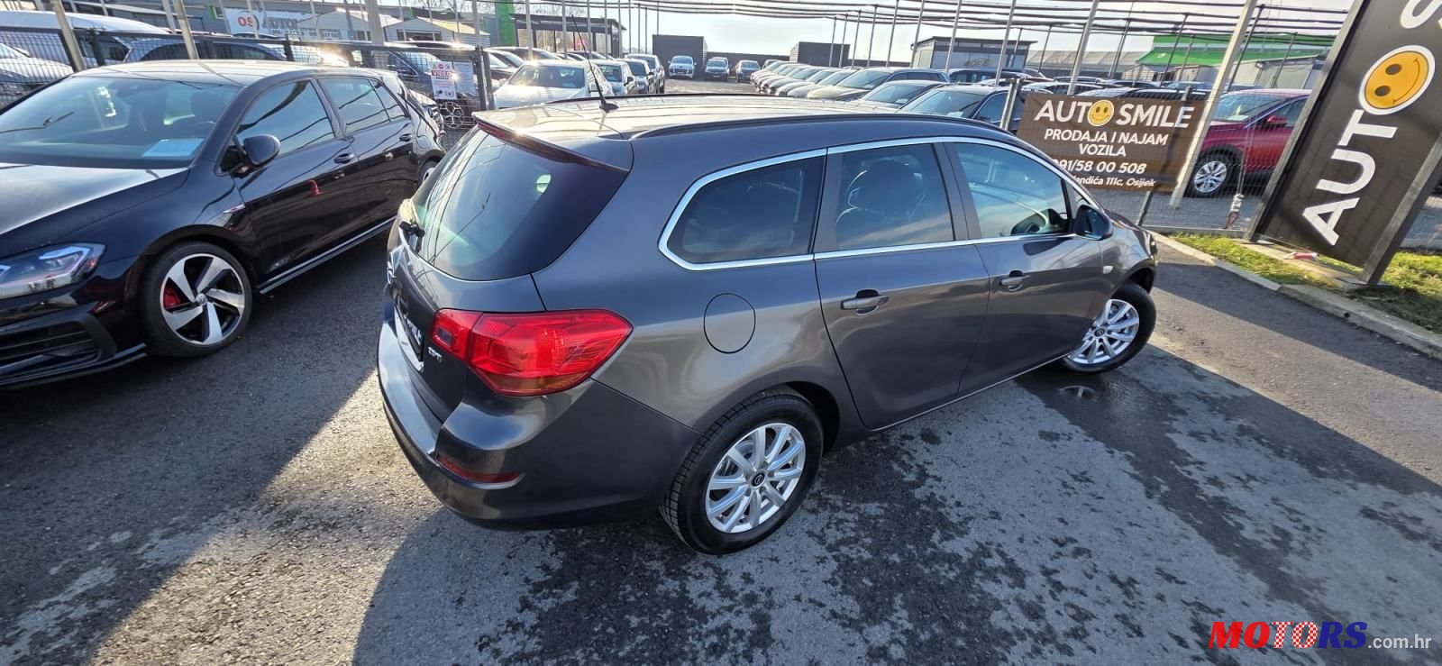 2012' Opel Astra Karavan photo #6