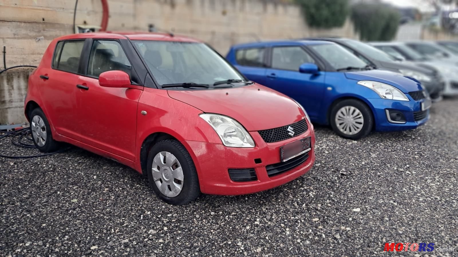 2005' Suzuki Swift 1,3 Gc photo #1