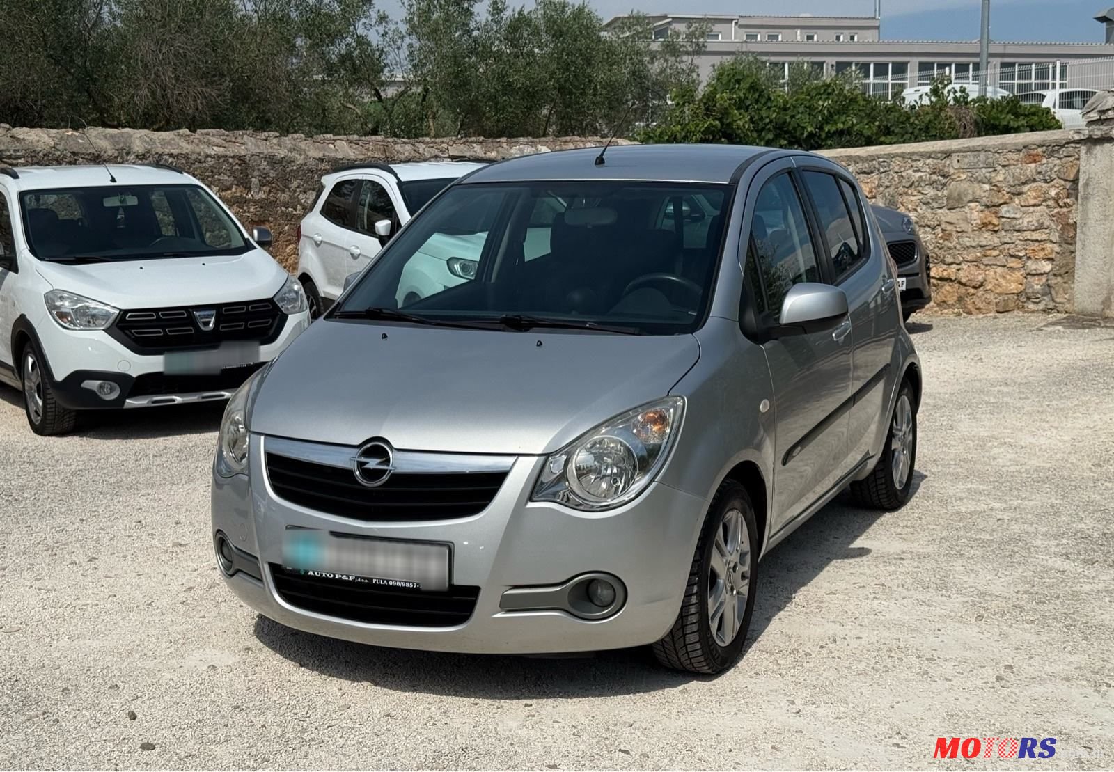 2012' Opel Agila 1.0 Ecoflex photo #2