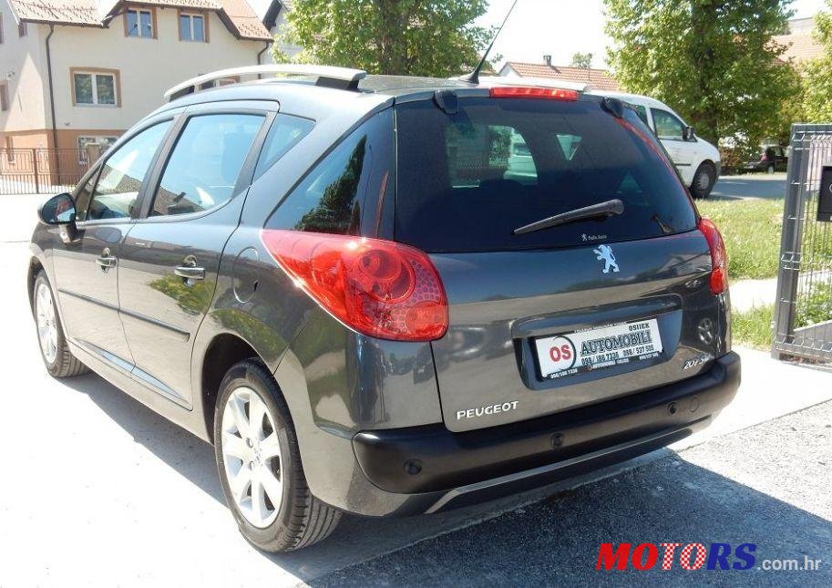 2007' Peugeot 207 Sw photo #1