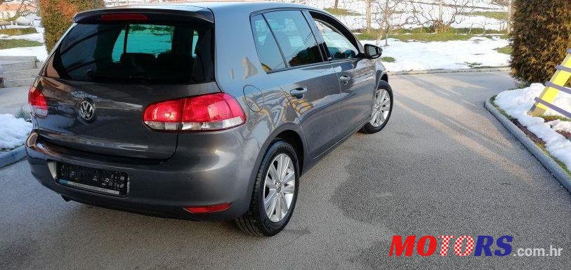 2012' Volkswagen Golf VI 1,6 Tdi photo #1