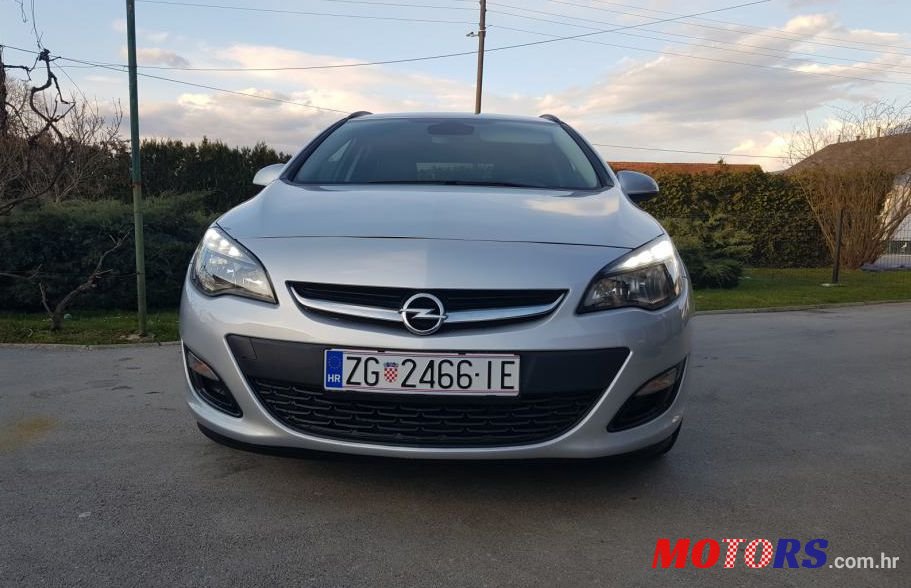 2015' Opel Astra Karavan photo #1