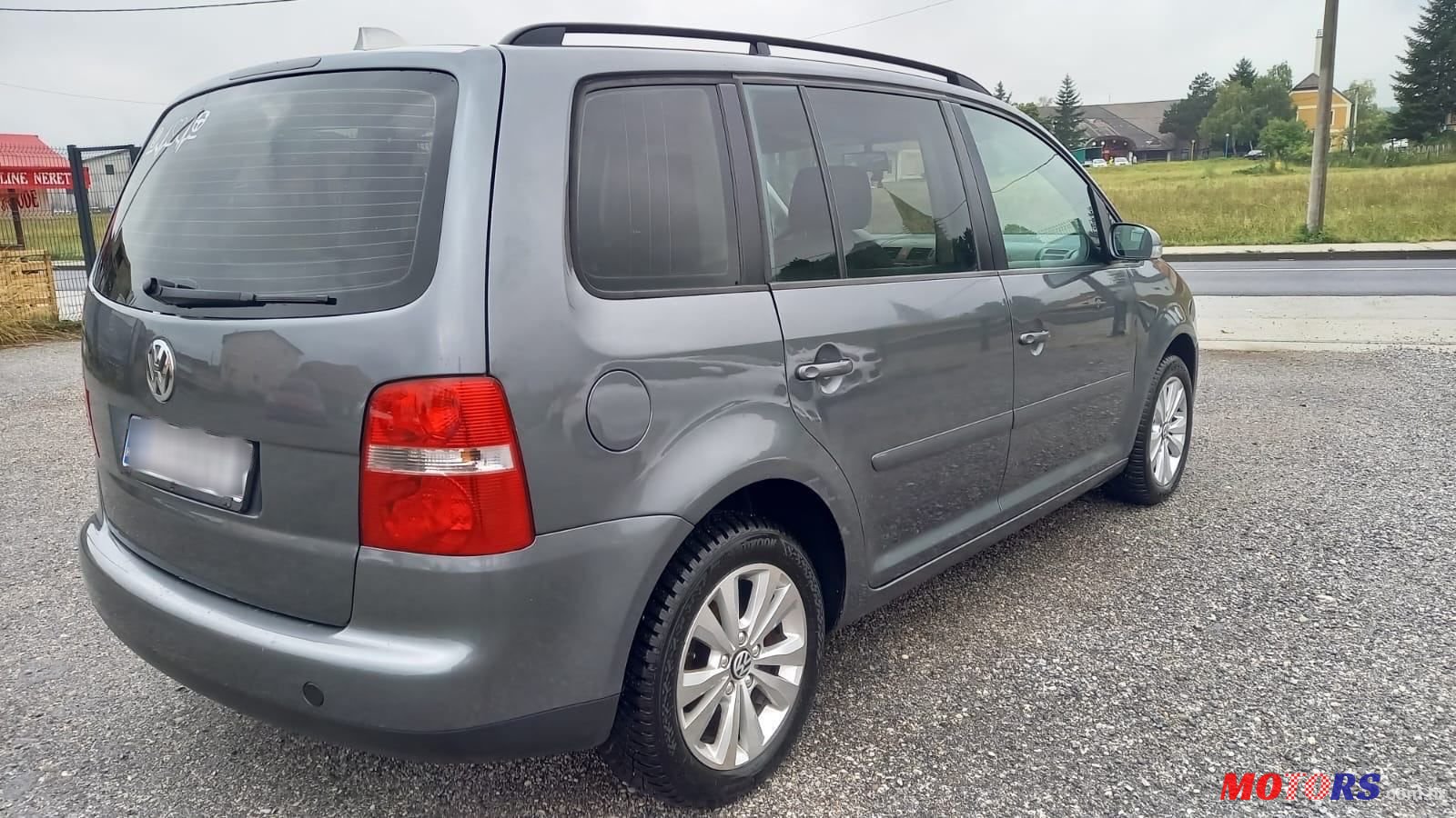 2004' Volkswagen Touran 2,0 Tdi photo #4
