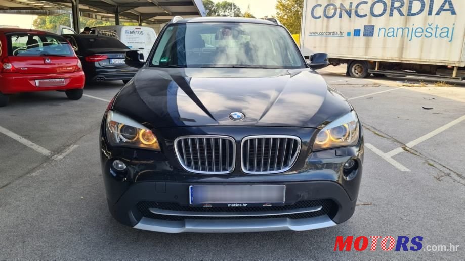 2011' BMW X1 Xdrive23D photo #1