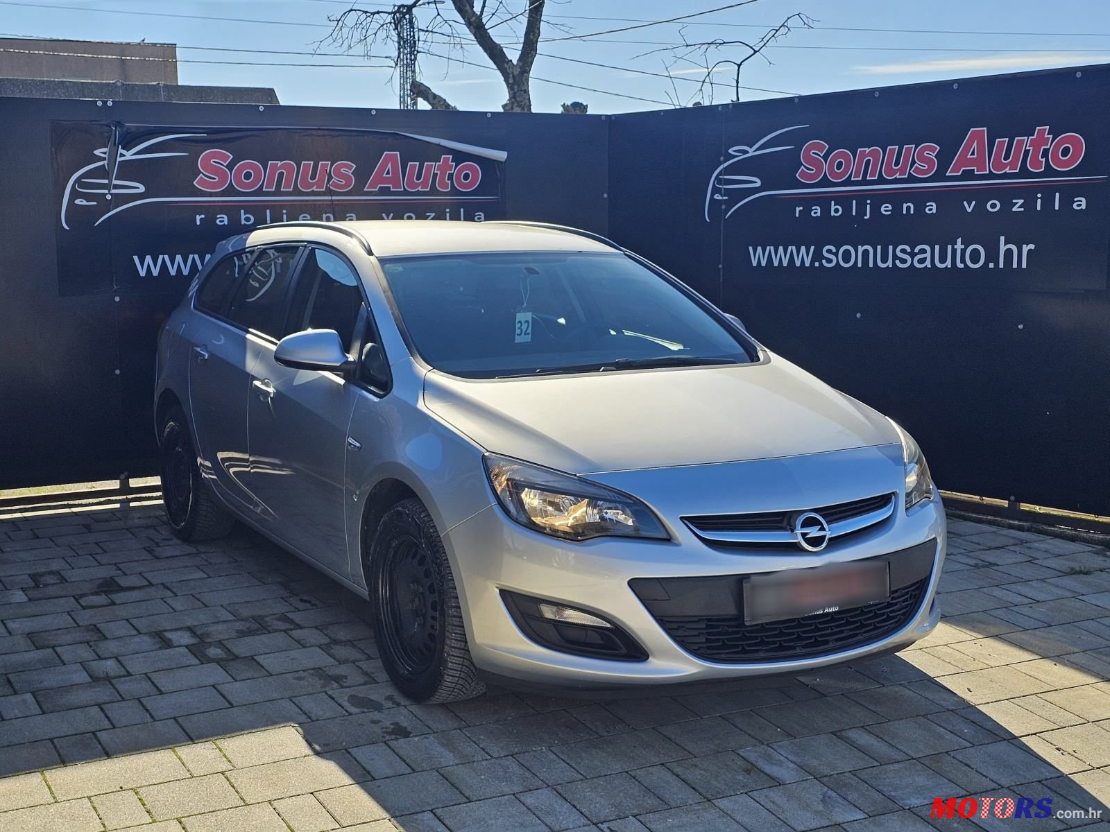 2015' Opel Astra Karavan photo #4