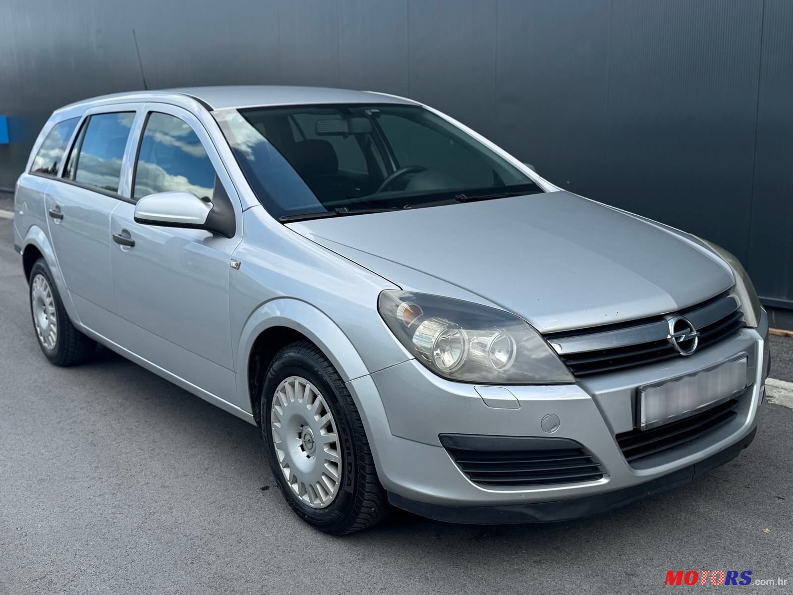 2006' Opel Astra Karavan photo #2