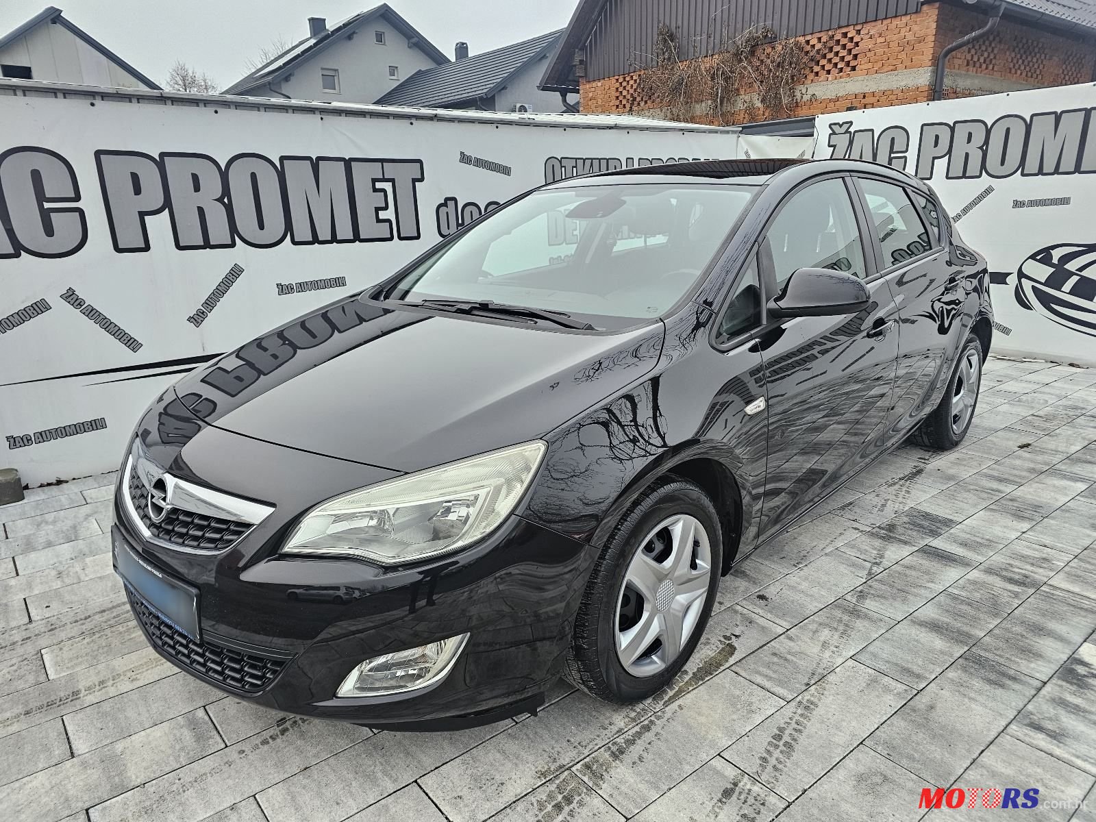 2009' Opel Astra 1,6 photo #1