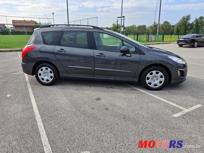 2014' Peugeot 308 Sw photo #5