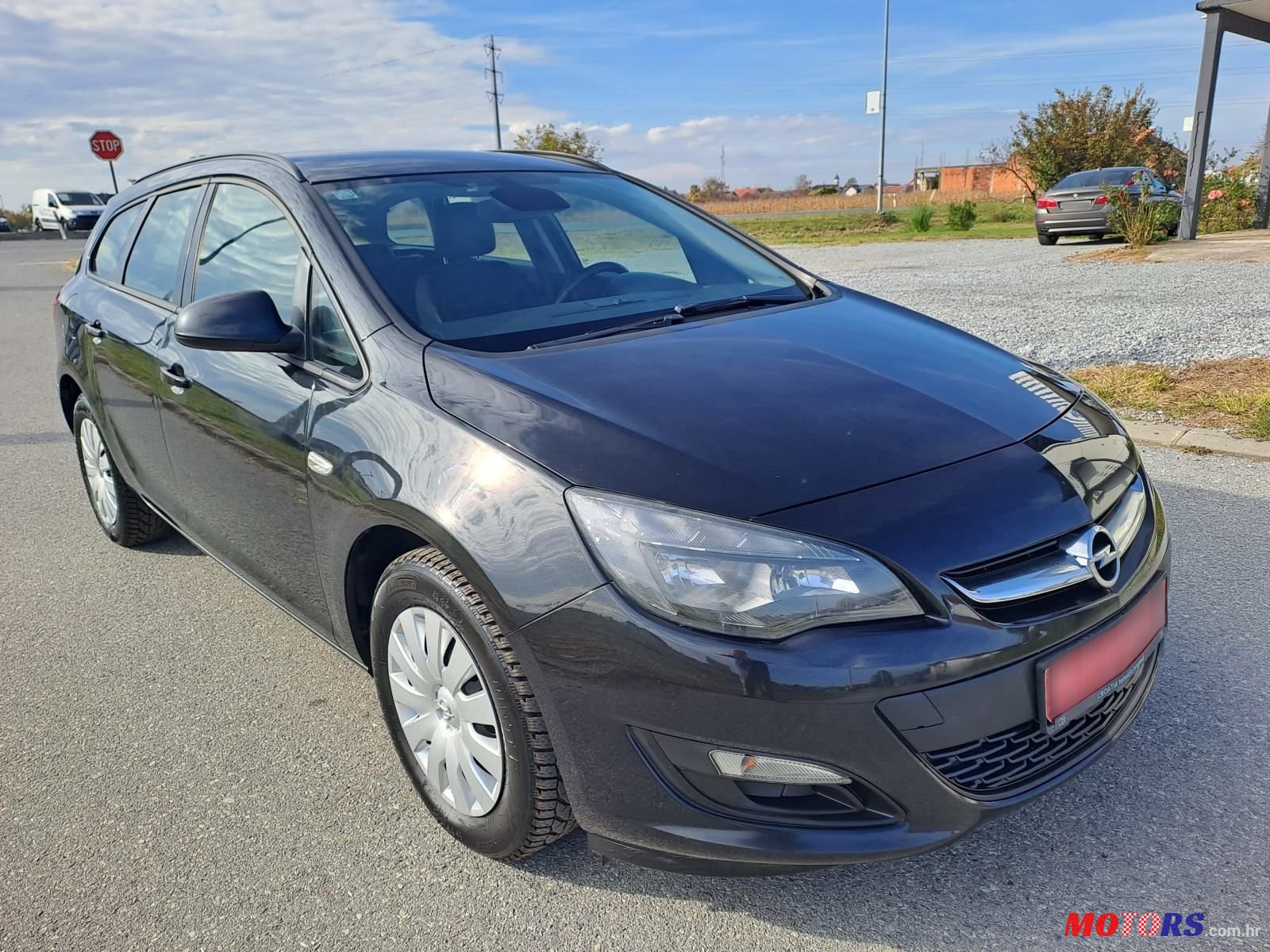 2015' Opel Astra Karavan photo #3