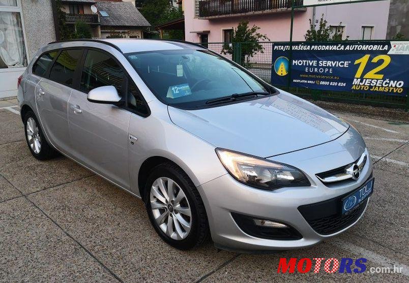 2012' Opel Astra Karavan photo #1