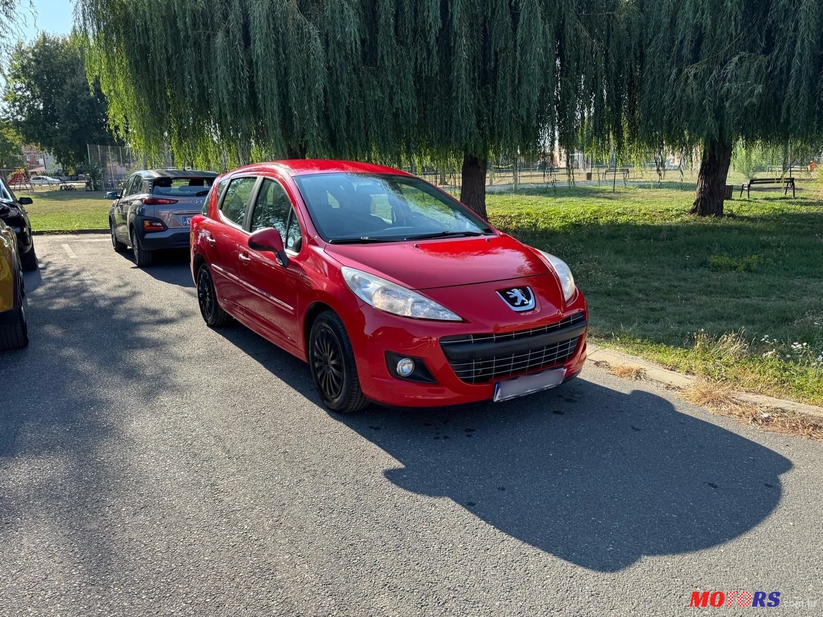 2013' Peugeot 207 Sw photo #1