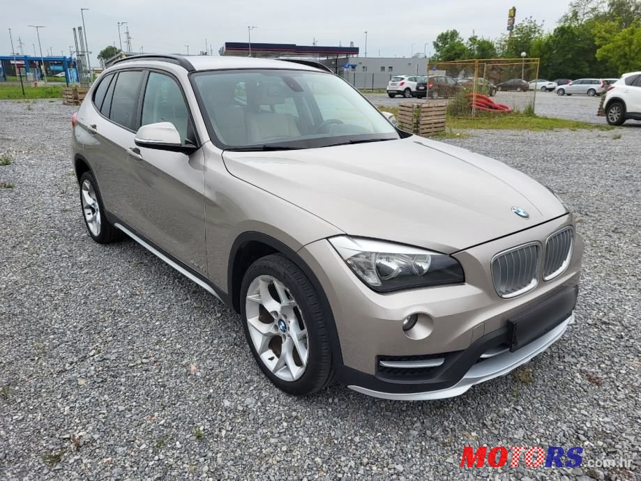 2014' BMW X1 Sdrive18D photo #3
