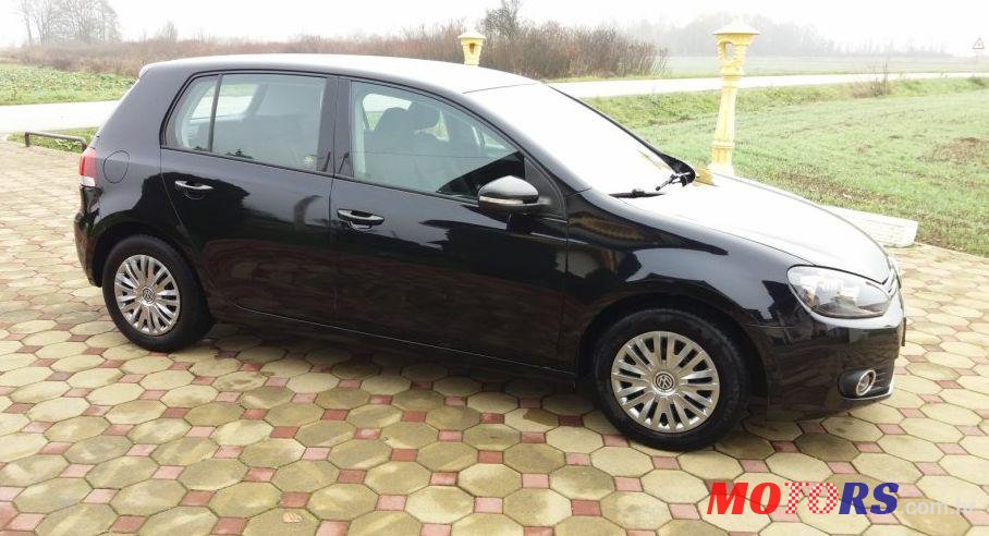 2009' Volkswagen Golf VI 1,6 Tdi photo #2