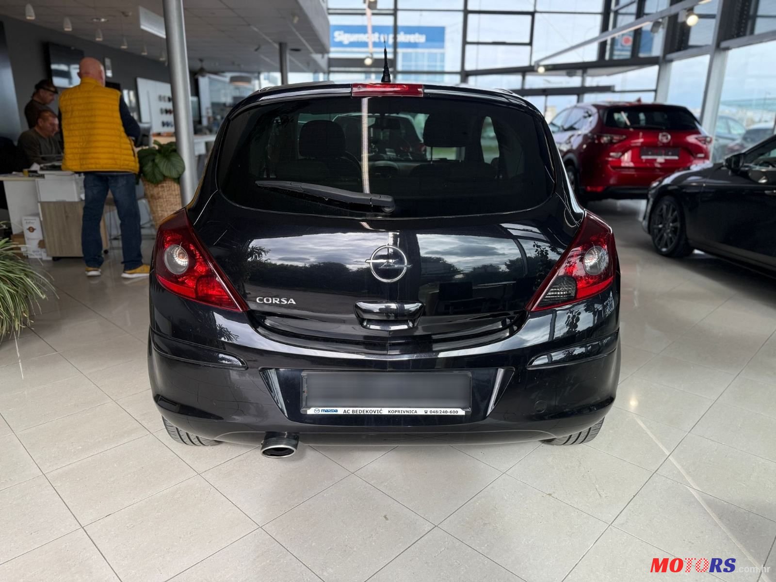 2010' Opel Corsa 1.4 Color Edition photo #6