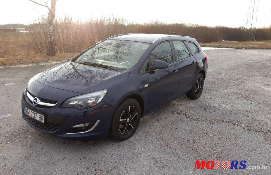 2013' Opel Astra Karavan photo #1