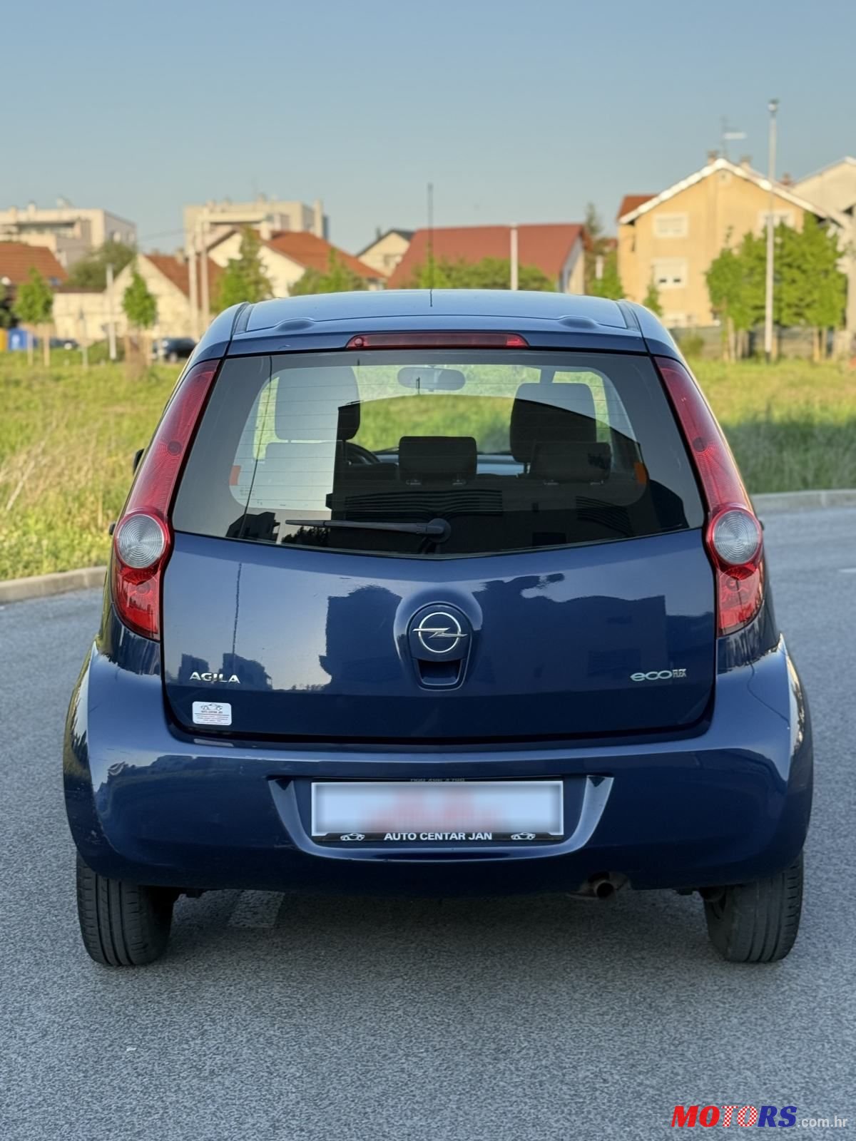 2009' Opel Agila 1,0 photo #5