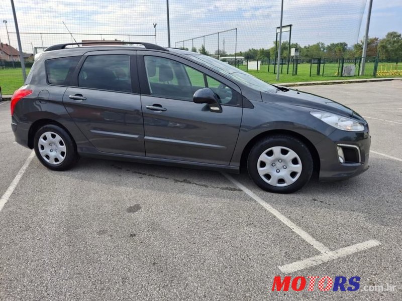 2014' Peugeot 308 Sw photo #6