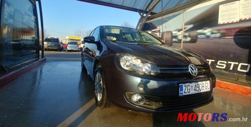 2009' Volkswagen Golf VI 1,6 photo #3